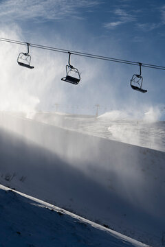 Empty chair lift on the ski slopes