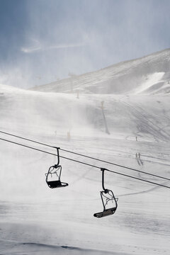 Empty chair lift on the ski slopes