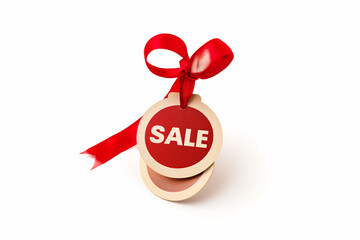 round badge with the inscription "SALE" on a white background