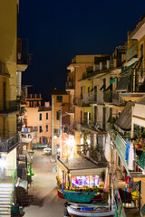 View of via Renata Birolli in Manarola, Italy by night. Manarola may be the oldest the second-smallest of the famous Cinque Terre towns. - 777774615