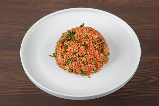 Quinoa salad with lentils and parsley in a bowl. Quinoa and lentils salad in a plate viewed from above - flat lay concept.