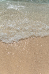 Sand beach and ocean wave