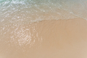 Sand beach and ocean wave