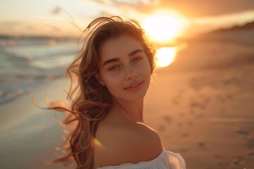 Fototapeta na wymiar A beautiful young woman standing on top of a beach
