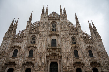 Fototapeta premium Architectural details of Gothic cathedral church in Milan, tourist attraction in northern Italy