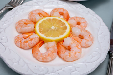 Catch of the day, fresh cooked shrimps served with lemon and garlic sauce in seafood restaurant