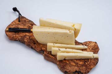 Fresh Asiago cow's milk cheese, from Asiago in Italy, used in panini or sandwiches or melted on variety of dishes, classified as a Swiss-type Alpine cheese