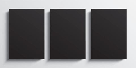 3 blank black paper posters hanging on a grey wall background. Poster gallery vector mockup for vertical art, image, or text placement.