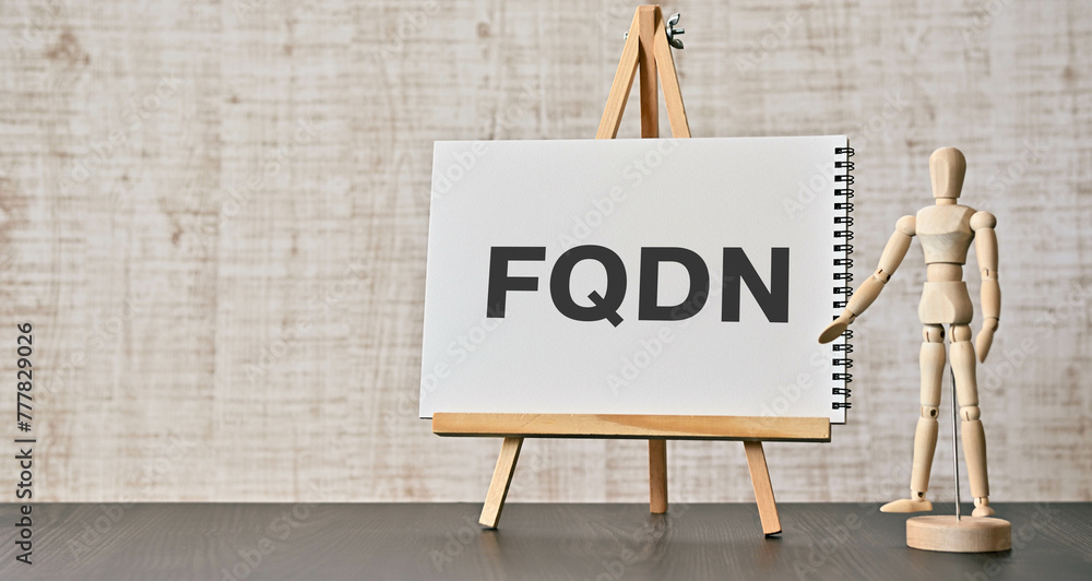 Poster there is notebook with the word fqdn. it is an abbreviation for fully qualified domain name as eye-c