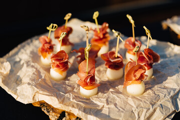 Prosciutto-Wrapped Mozzarella Cheese Appetizers. Savory appetizer bites of mozzarella cheese...
