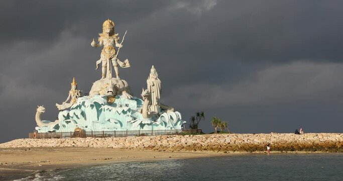Statue of Varuna in Pantai Jerman Beach in Kuta, Bali Island, Indonesia 