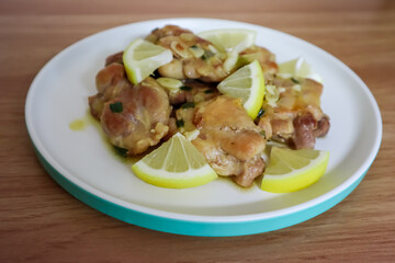 Lemon butter chicken served on plate, ready to eat