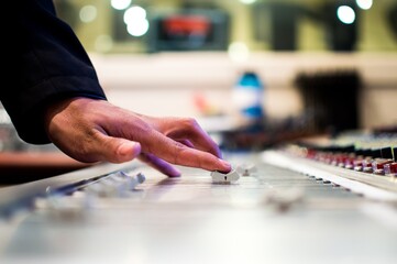 close up of a dj mixing music