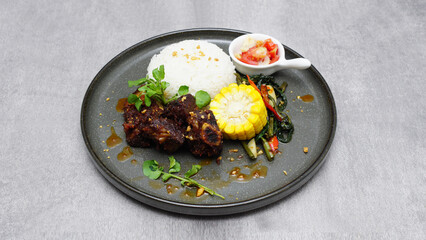 Special Dish, rice, corn, kale, tomatoes, black pepper beef ribs