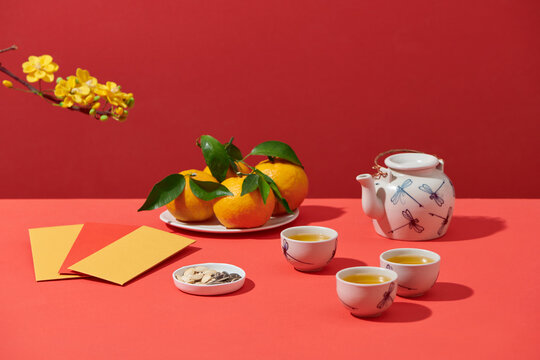 New year table with fruits, nut and tea.