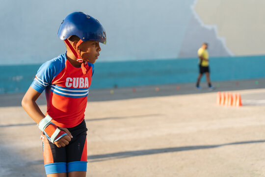 Black Child Skating Outdoors.