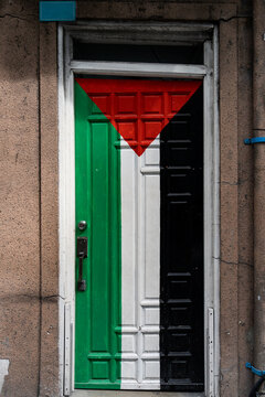 A front door painted with the Palestine flag in Mal&eacute;, Maldives