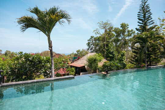 Woman in an infinity pool