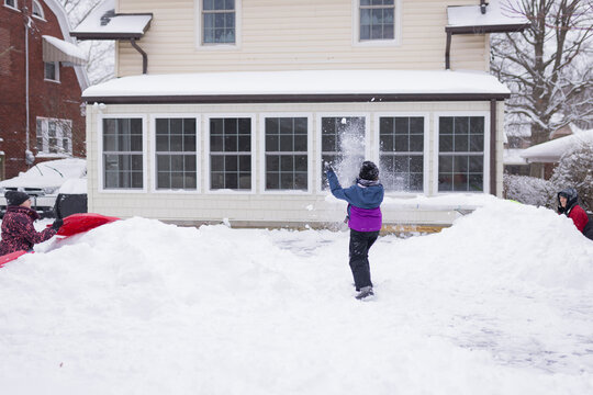 Snow Day: Snowball fight with their dad.
