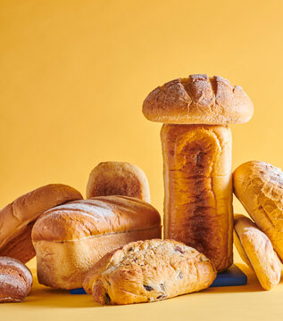 Loafs of bread on a yellow background