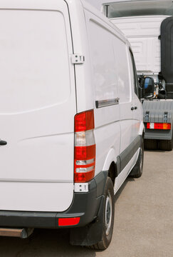 White van and truck on the parking
