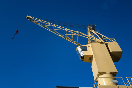 Yellow crane, blue sky