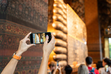 Taking photos in a temple.