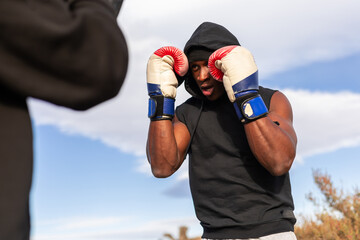 
two friends training in the desert