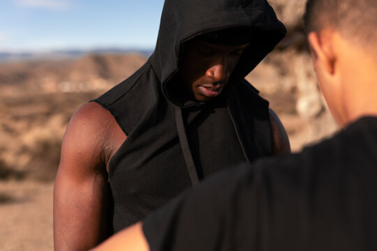 
two friends training in the desert