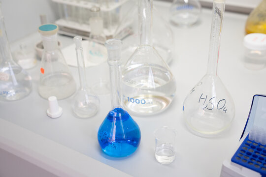 Beakers And Flasks On The Lab Table