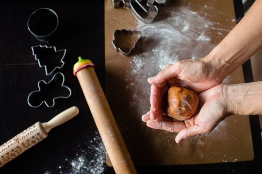 Gingerbread dough in woman's hands
