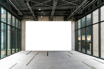 Mockup large blank billboard on the wall of empty room in building