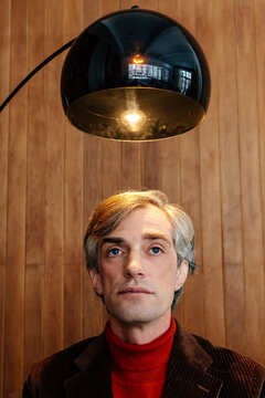 Man under light of inspiration