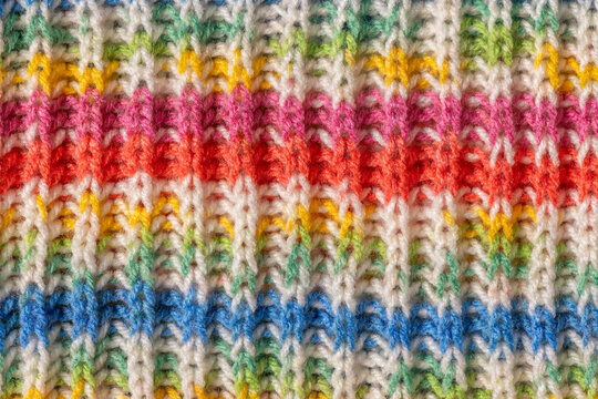 Colorful knitted wool pattern macro