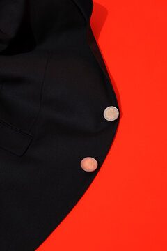 Classic elegant suit jacket with shiny golden euro coins as buttons