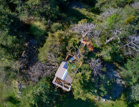 Offgrid solar cell panel on rooftop of treehouse
