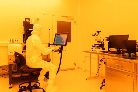 Scientist Using A Compact Aligner Platform