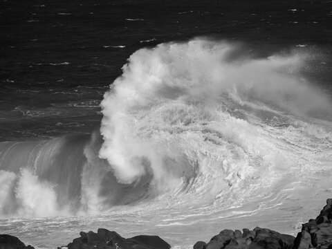 A powerful stormy uniquely shaped wave created by gale force winds