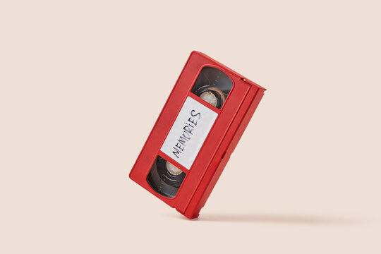 Red vhs video cassette tape with handwritten inscription Memories