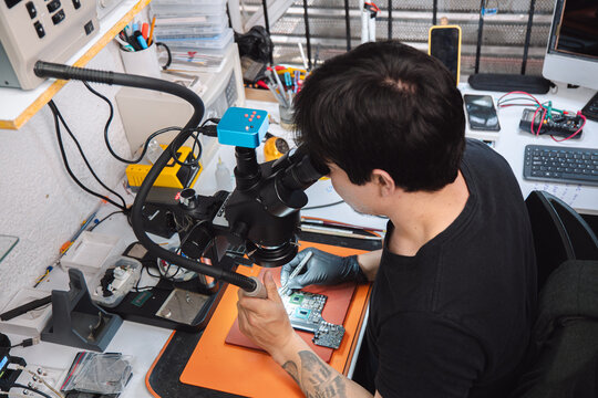 Man repairing a chip