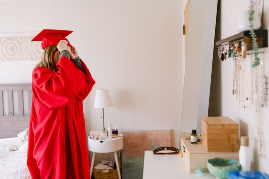 Red Cap And Gown - Powered by Adobe