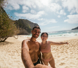 Selfie of a couple on the beach