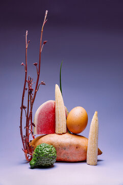 Art still life with sweet potato and corn.