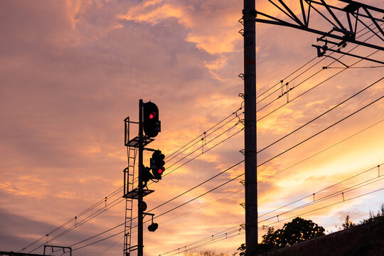 Sunset Over Railroad Signals
