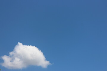 Blue sky with white cloud. Blue background. The summer sky is colorful clearing day and beautiful nature in the morning. for backdrop decorative and wallpaper design. The perfect sky background.