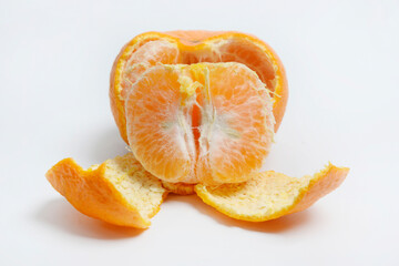 Tangerines or mandarin oranges (Citrus reticulata) are oranges that can grow in tropical and subtropical areas, randomly some are whole, some have been cut, with a white background
