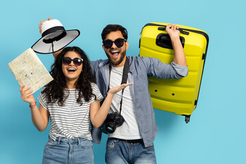 Young Couple Vacation. Adults Bright Yellow Suitcase, Showcasing Their Readiness For A Holiday...
