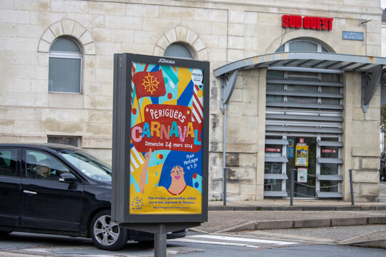 France, 10 March 2024 : Advertising billboard of P&eacute;rigueux Carnival with JCDecaux and Sud Ouest branding.