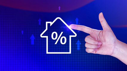 Real estate property investment concept, Asset management, Interest rates, inflation, loan mortgage, increase tax. Hand holding house icon with percent and rise arrow.