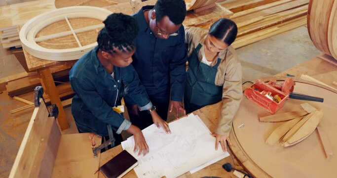 Artisan, carpenter and team for workshop, manufacturing or products design for woodwork. Engineer, discussion and above blueprints for creative, building or factory startup for small business project